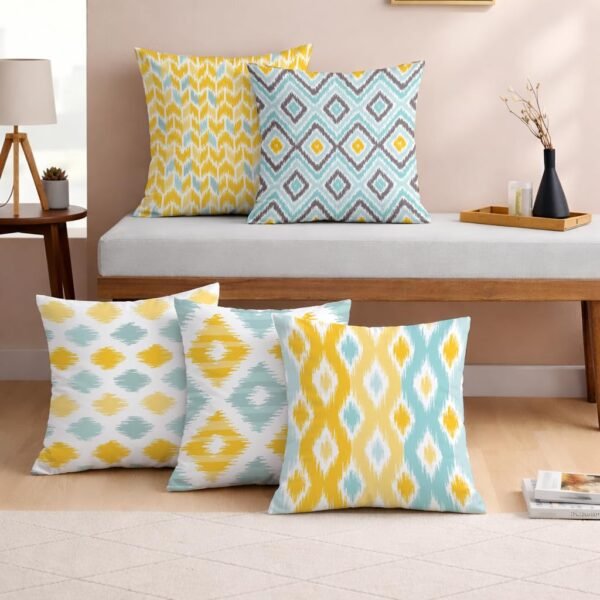 STITCHNEST Jute Cushion Cover Set of 5 (16×16) Yellow & Aqua Ikat Jute Cushion Cover Set (16 × 16 Inches, Pack of 5, Yellow & Aqua Ikat Print)