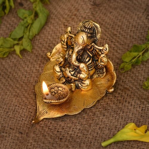 Collectible India Lord Ganesha Idol with Diya on Leaf Base